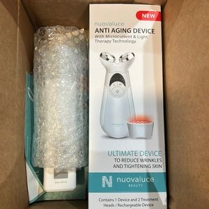 Antiaging device w/ micro current & light therapy reduce wrinkles & tighten skin